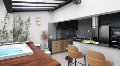 Estilo industrial: apê na Vila Madalena tem hidromassagem e área gourmet